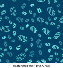 Green line Sewing thread on spool icon isolated seamless pattern on blue background. Yarn spool. Thread bobbin.  Vector