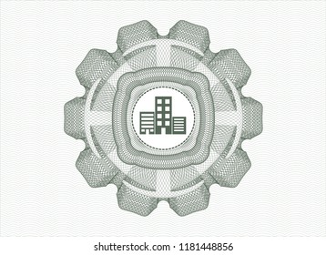 Green linear rosette with buildings icon inside