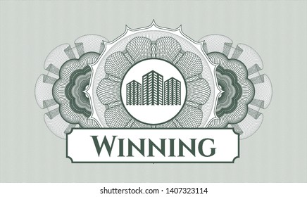 Green linear rosette with buildings icon and Winning text inside