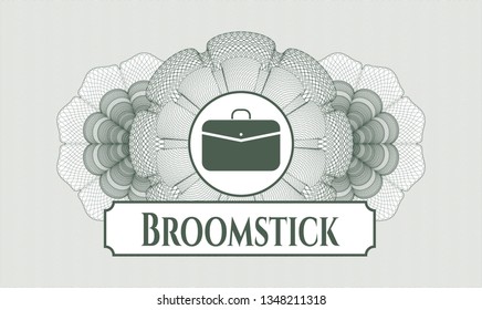 Green linear rosette with business briefcase icon and Broomstick text inside