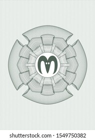 Green linear rosette with goat head icon inside