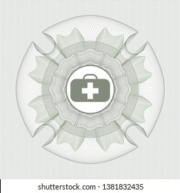 Green linear rosette with medical briefcase icon inside