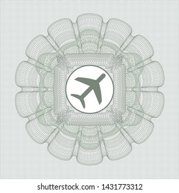 Green linear rosette with plane icon inside