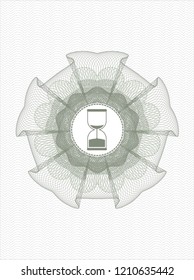 Green linear rosette with sand clock icon inside
