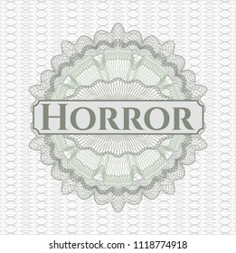Green linear rosette with text Horror inside