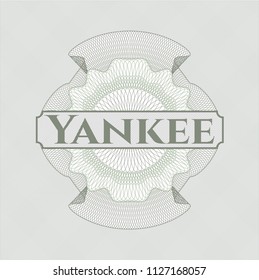 Green linear rosette with text Yankee inside