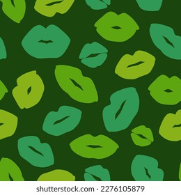 Green lip print on green background. Cute seamless pattern with kiss. Decorative wallpaper for St Patrick's day holiday design. Vector stock illustration	