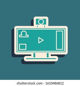 Green Live streaming online videogame play icon isolated on blue background. Long shadow style. Vector Illustration