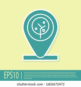 Green Location and tree icon isolated on yellow background.  Vector Illustration