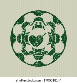 Green love icon inside distressed rubber grunge stamp