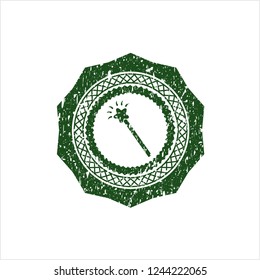 Green magic stick icon inside distressed rubber stamp with grunge texture