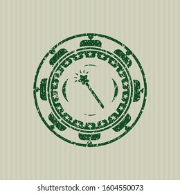 Green magic stick icon inside grunge seal