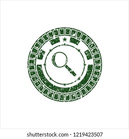 Green magnifying glass icon inside distress rubber grunge seal