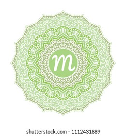 Green Mandala Monogram Logo. Circular figure representing the universe in Hindu and Buddhist symbolism