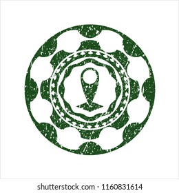 Green map pointer icon inside distressed grunge style stamp