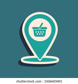 Green Map pointer with shopping basket icon isolated on blue background.   Vector Illustration