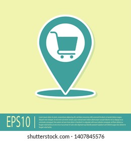 Green Map pointer with shopping cart icon isolated on yellow background. Pin point shop and shopping. Supermarket basket symbol. Vector Illustration