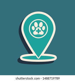Green Map pointer with veterinary medicine hospital, clinic or pet shop for animals icon isolated on blue background. Vet or veterinarian clinic. Long shadow style. Vector Illustration