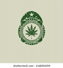 Green marijuana leaf, weed icon inside distressed grunge stamp