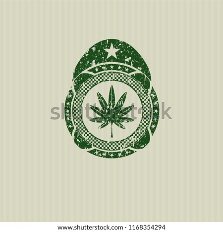 Green marijuana leaf, weed icon inside distressed grunge stamp