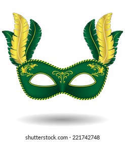 Green mask with feathers isolated on white background