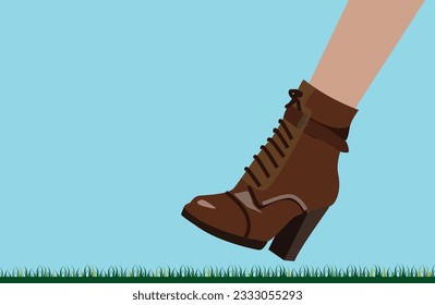 
Green meadway and one female leg steps with boot on the grass