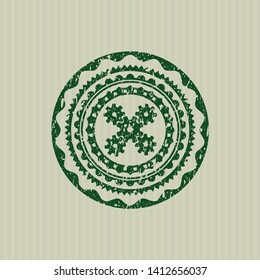Green mechanism icon inside distress rubber seal