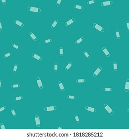 Green Medical protective mask icon isolated seamless pattern on green background.  Vector Illustration