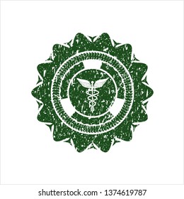 Green medicine icon inside distressed rubber stamp