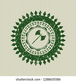 Green medieval axe icon inside distressed rubber grunge stamp