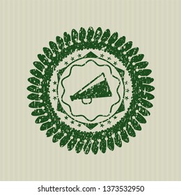 Green megaphone icon inside rubber grunge stamp