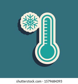 Green Meteorology thermometer measuring heat and cold icon isolated on blue background. Thermometer equipment showing hot or cold weather. Long shadow style. Vector Illustration