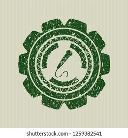 Green microphone icon inside rubber seal with grunge texture