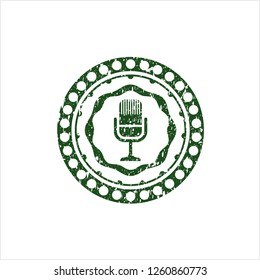 Green microphone icon with rubber seal texture