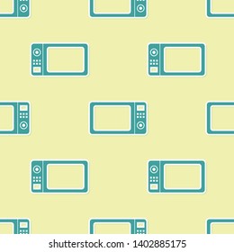 Green Microwave oven icon isolated seamless pattern on yellow background. Home appliances icon.Vector Illustration