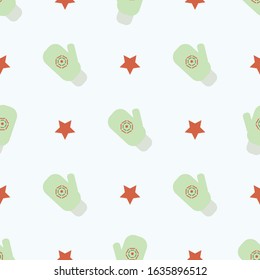 Green mitten with an abstract pattern and a red star on a light green background