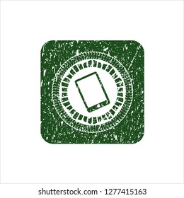 Green mobile phone icon inside distress rubber seal with grunge texture