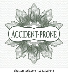 Green money style emblem or rosette with text Accident-prone inside