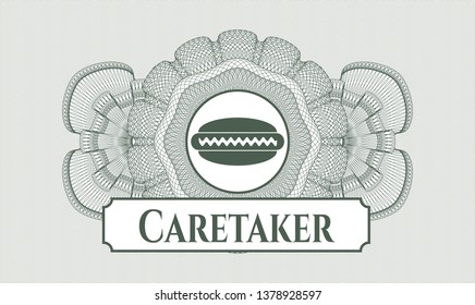 Green money style emblem or rosette with hot dog icon and Caretaker text inside