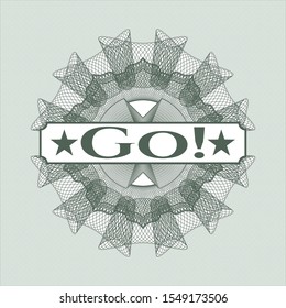 Green money style emblem or rosette with text Go! inside