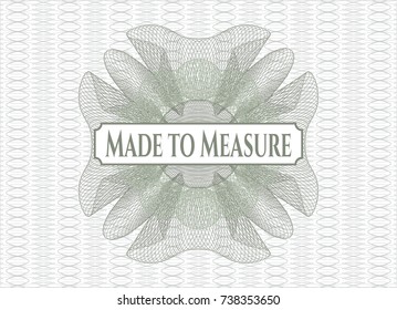 Green money style emblem or rosette with text Made to Measure inside