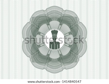 Green money style emblem or rosette with chef icon inside