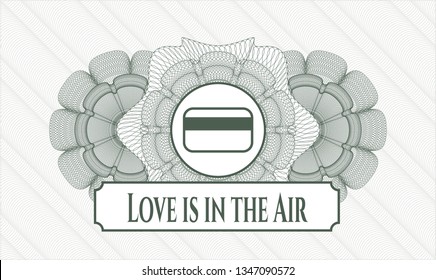 Green money style rosette with credit card icon and Love is in the Air text inside