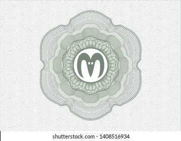 Green money style rosette with goat head icon inside