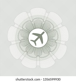 Green money style rosette with plane icon inside