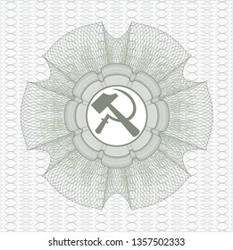 Green money style rosette with sickle and hammer icon inside
