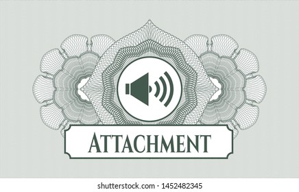 Green money style rosette with sound icon and Attachment text inside