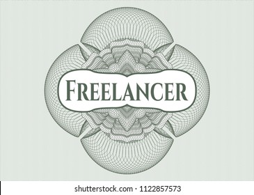 Green money style rosette with text Freelancer inside