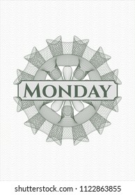 Green money style rosette with text Monday inside
