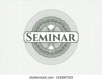 Green money style rosette with text Seminar inside